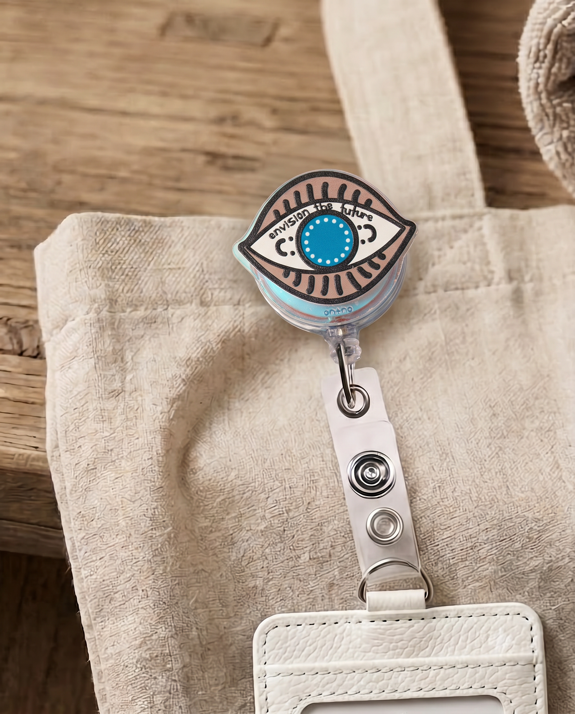 Retractable badge reel - eyelet